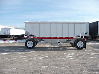 Rebuilt aluminum and steel hopper trailer side view