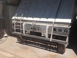 Rebuilt aluminum and steel hopper trailer back view